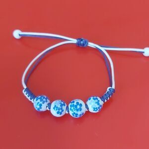 Painted Blue Flowers White Plastic Beads Adjustable Cord Bracelet